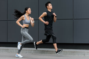 Young couple jogging together.