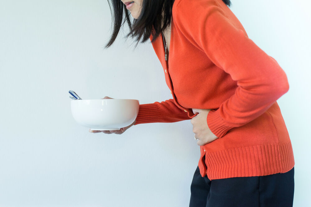 Woman having issues with digestion.